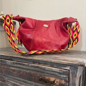 Hand Made in Columbia leather WAYUU great used condition measures 17” x 11” hobo